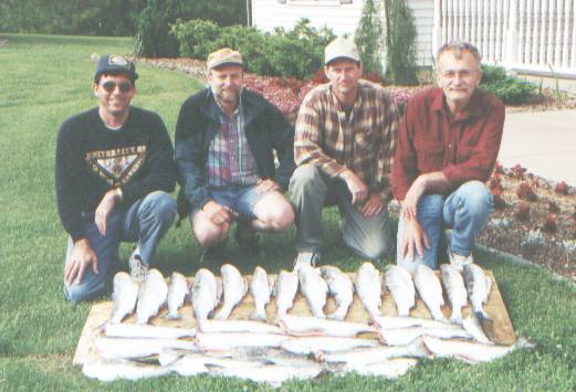 Ken, Doug Johnson, Doug Umlandt, Ken Hyman after Lake Michigan fishing trip